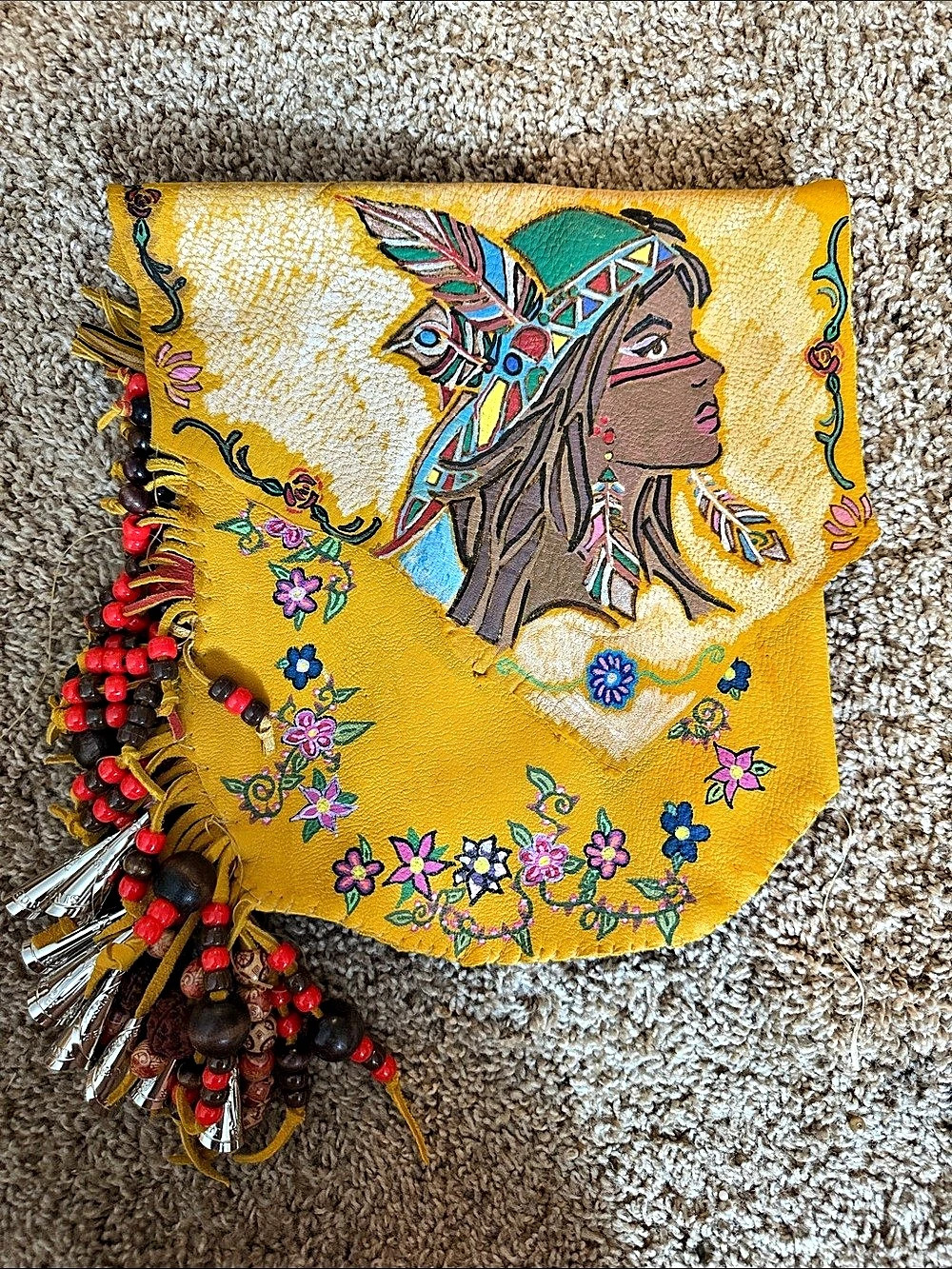 Embellished Portrait Clutch in Yellow three leather bags that aren’t finished th